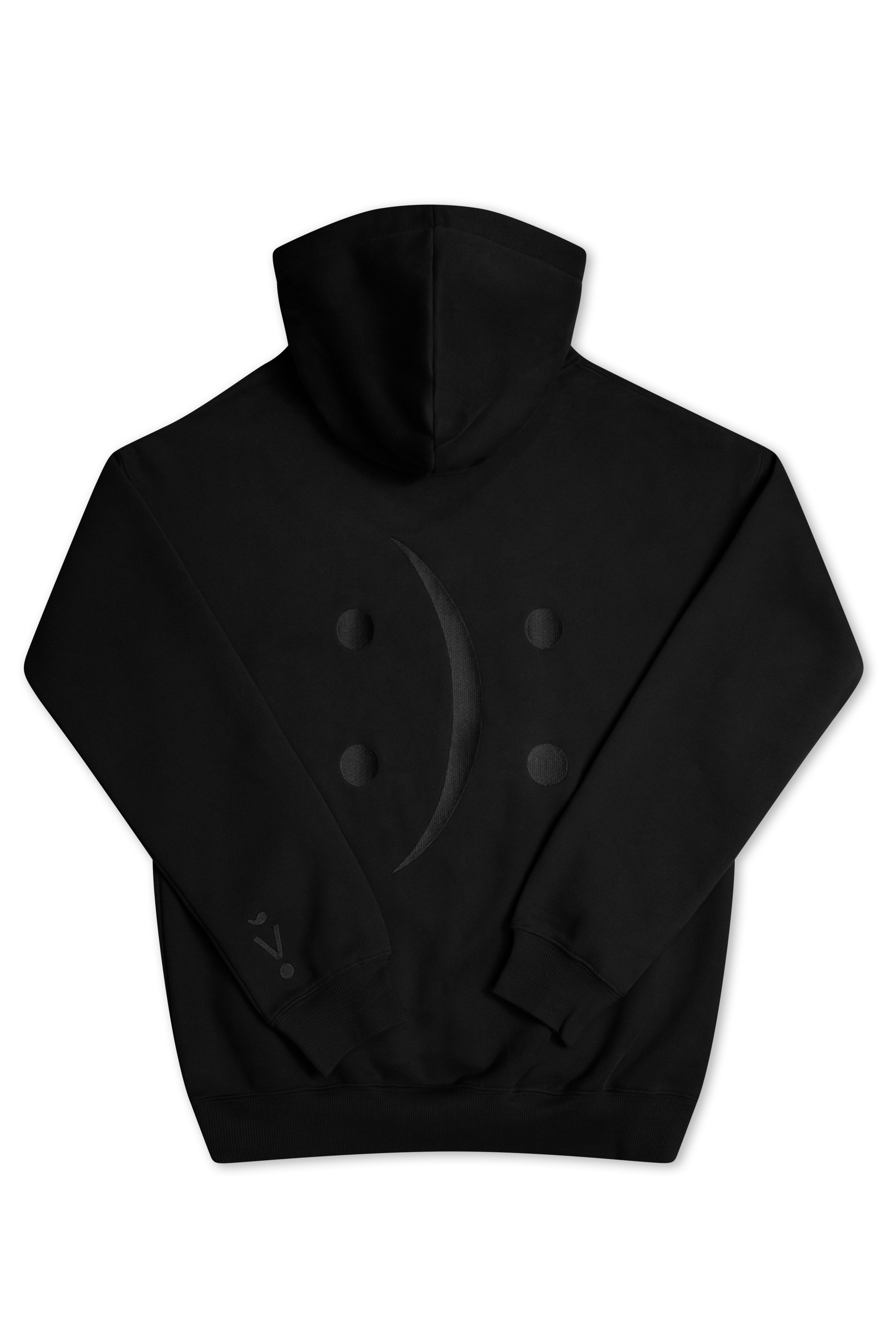 A black pullover hoodie shown from the back, featuring a tonal dark gray crescent moon and dot graphic across the upper back.